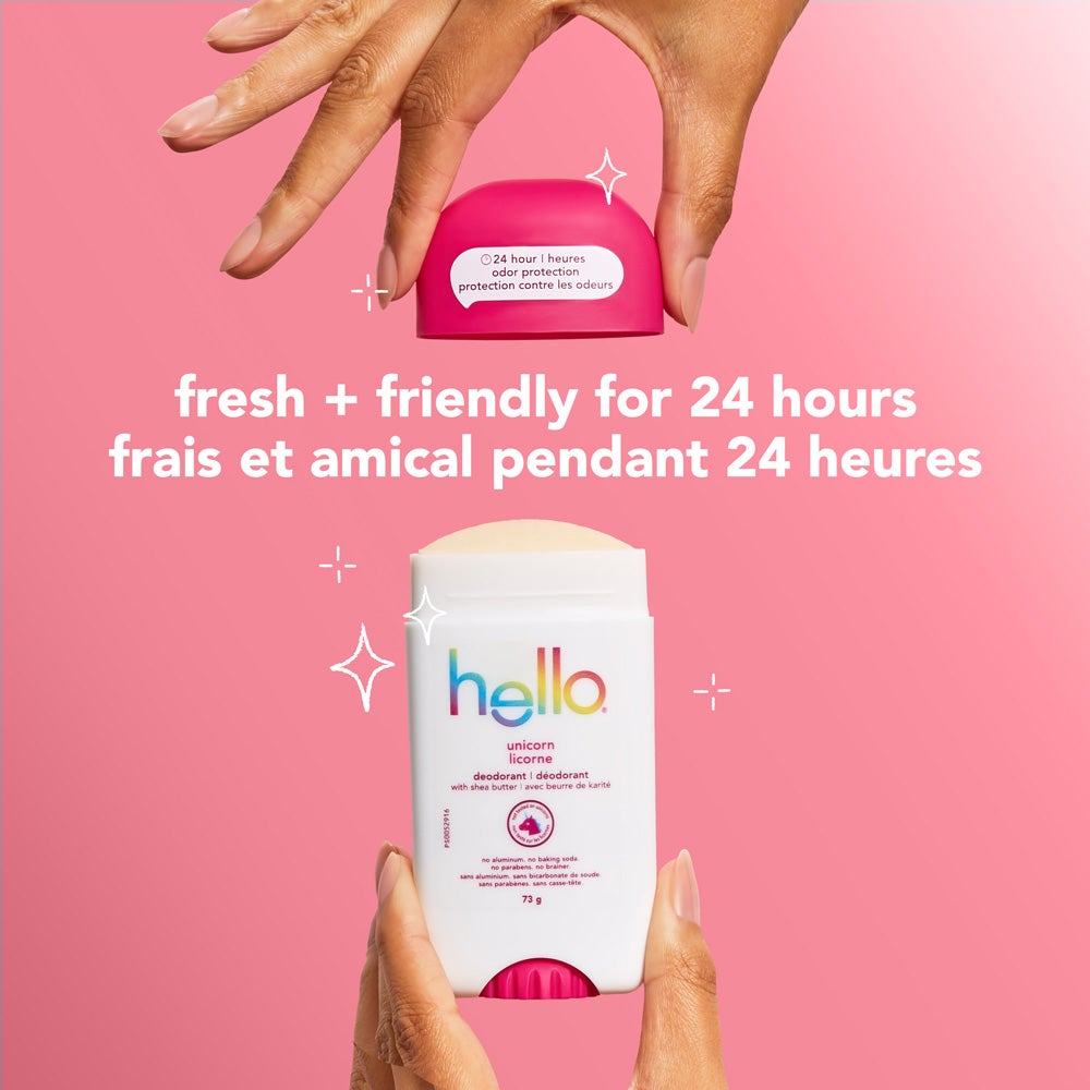 A white bottle of Hello Unicorn deodorant. The bottle has blue and green lettering and states "24 hour odor protection," "fresh + friendly for 24 hours," "with shea butter," "no aluminum," "no baking soda," "no parabens," and "no brainer" in both English and French. The image also includes the word "unicorn" in English and French.