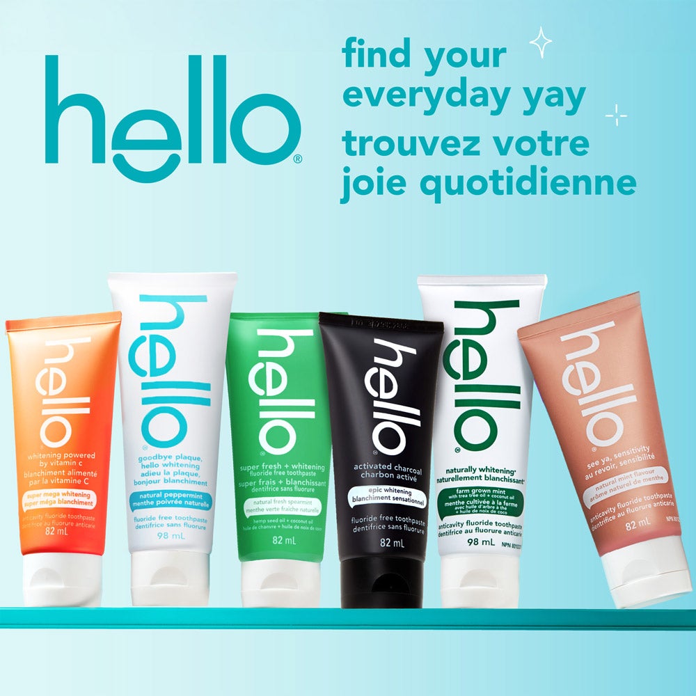 A row of five hello brand toothpaste tubes in different colors and varieties, standing upright on a turquoise surface with a turquoise background. The text above the tubes reads "find your everyday yay" in English and French. The hello logo appears in the top left corner.